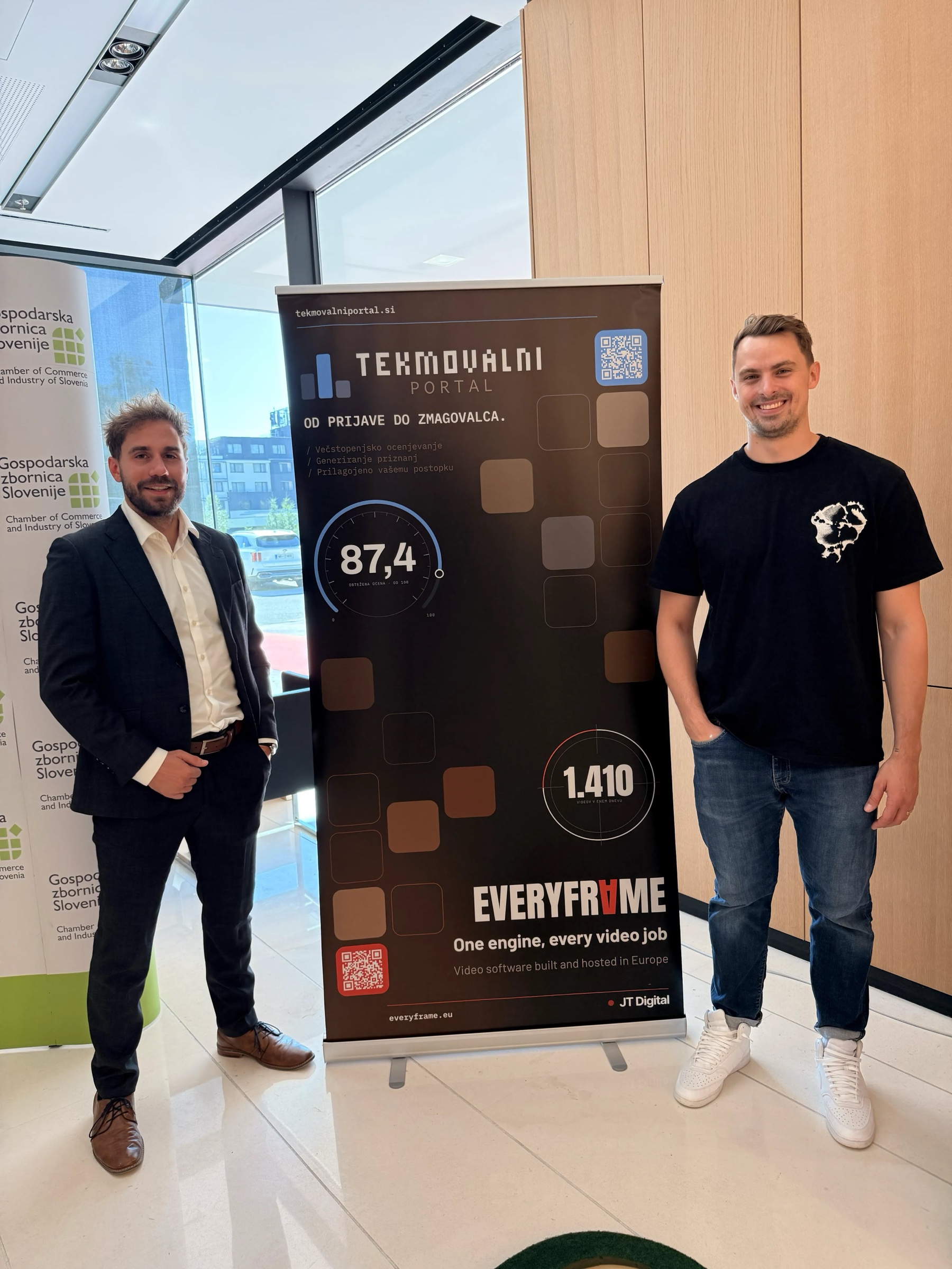 Two members of the JT Digital team beside the Tekmovalni portal and Everyframe banner at the JT Digital stand at Dan inovativnosti 2026